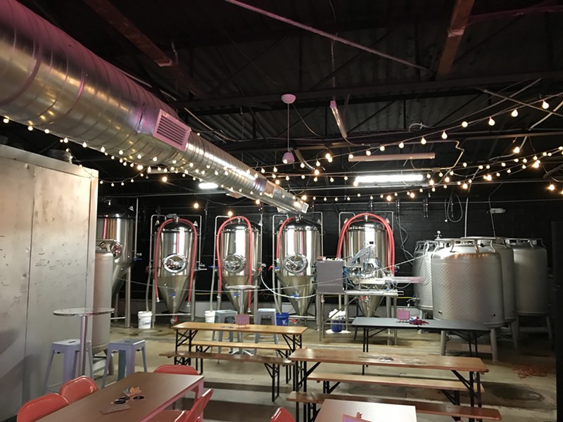 The taproom at Celestial Beerworks is filled with kitschy decor and nods to the brewery's spacey theme.