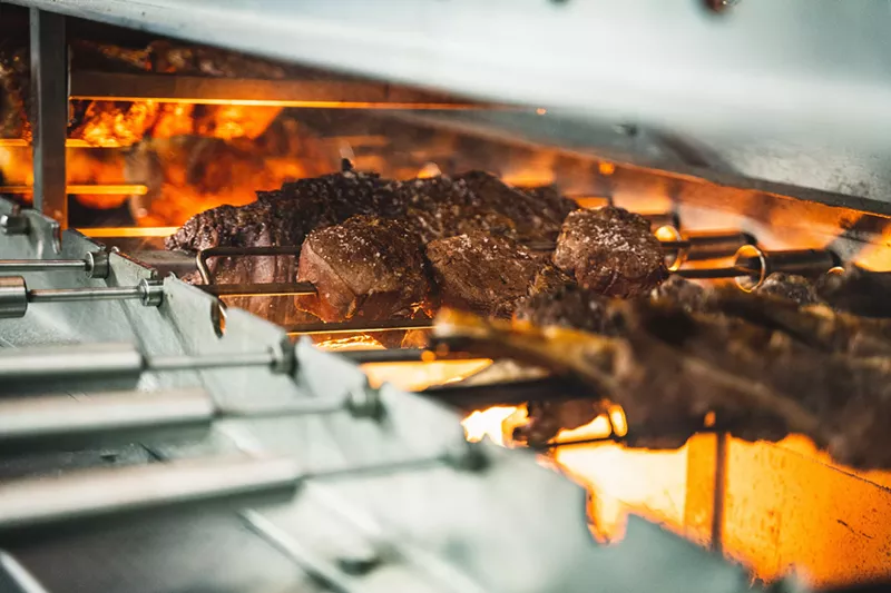 Image: Chama Gaucha is now open in Grapevine with lots of meat roasting over the fire.