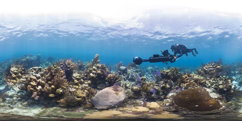 Image: A camera crew captures underwater footage of Glover's Reef, a coral reef off the coast of Belize, for the Netflix documentary Chasing Coral, produced in association with Fort Worth native and Argent Pictures co-founder Jill Ahrens.
