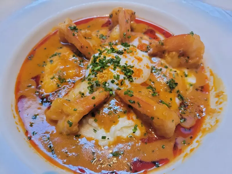 Image: A perfect 63-degree egg sits like a crown atop shrimp and grits at Meddlesome Moth