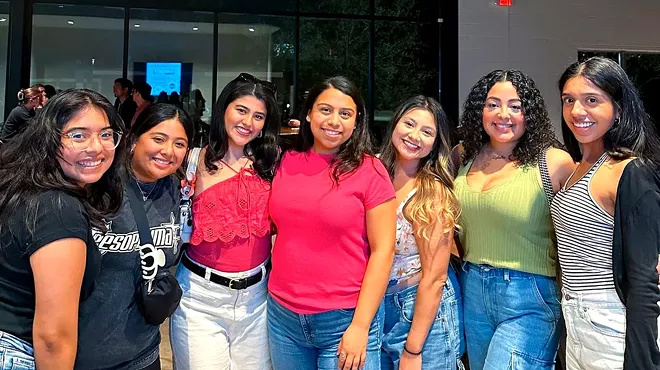 Members of the Latina Social Club DFW on trivia night