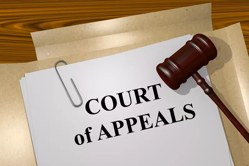 Image: Despite waiving her right to appeal, Suzanne Wooten won her appeal.