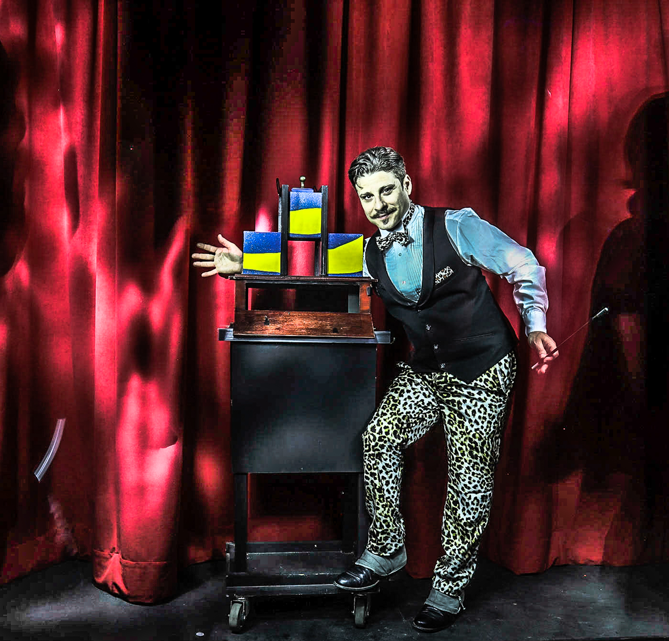 Edward Ruiz, also known as Deep Ellum's most famous magician Confetti Eddie, performing an illusion at his magic parlor on Exposition Avenue.