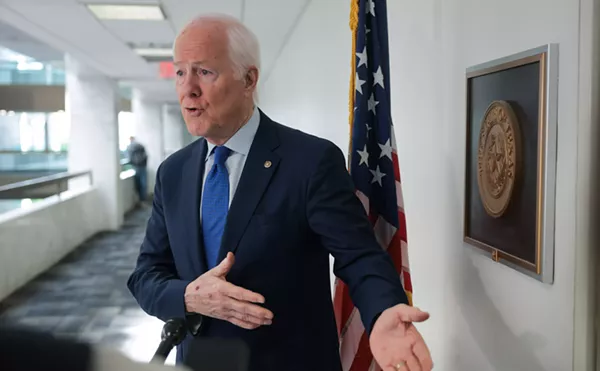 Image: Cornyn Roasts Ken Paxton Online With 'Sidepiece' Kiss Cam Tweet