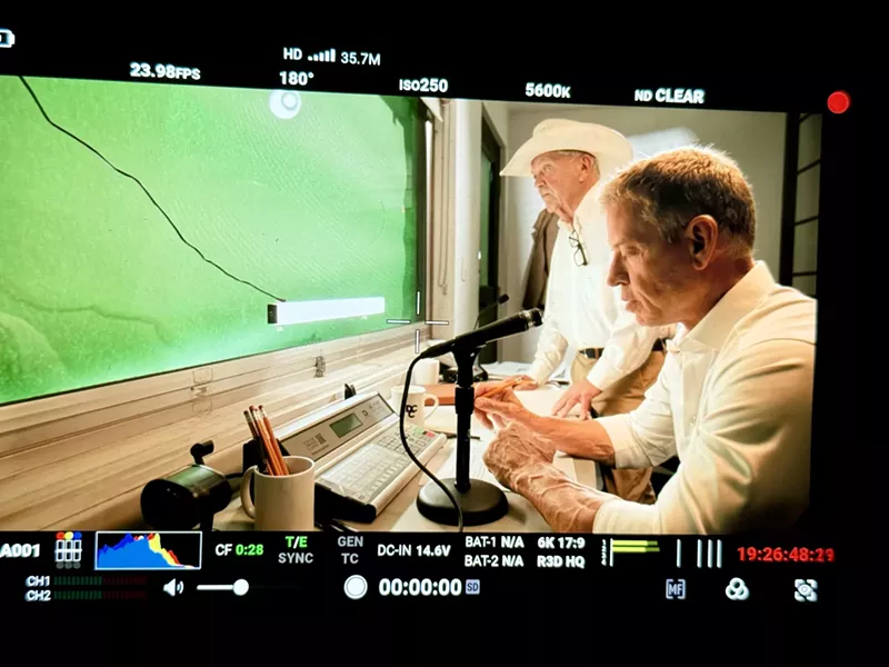 Image: Troy Aikman in the "pressbox" while filming the video for Wade Bowen's video for the song "Friday Night."