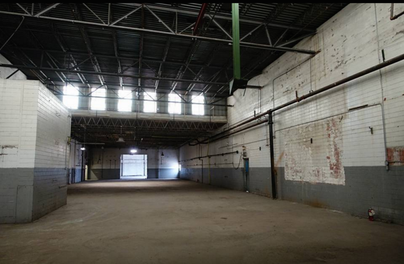The old Dixie Wax Paper building in Oak Cliff will soon be Dallas' newest coworking space.