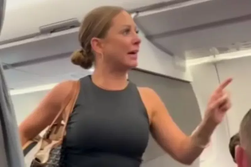 Image: Crazy plane lady wants to make sure the internet knows she's "anti-woke" now.
