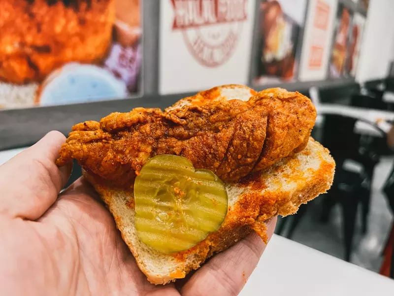 Image: Crimson Coward's hot tender tells no lies — it slaps. Pickles and a slice of white bread are Nashville-legit.
