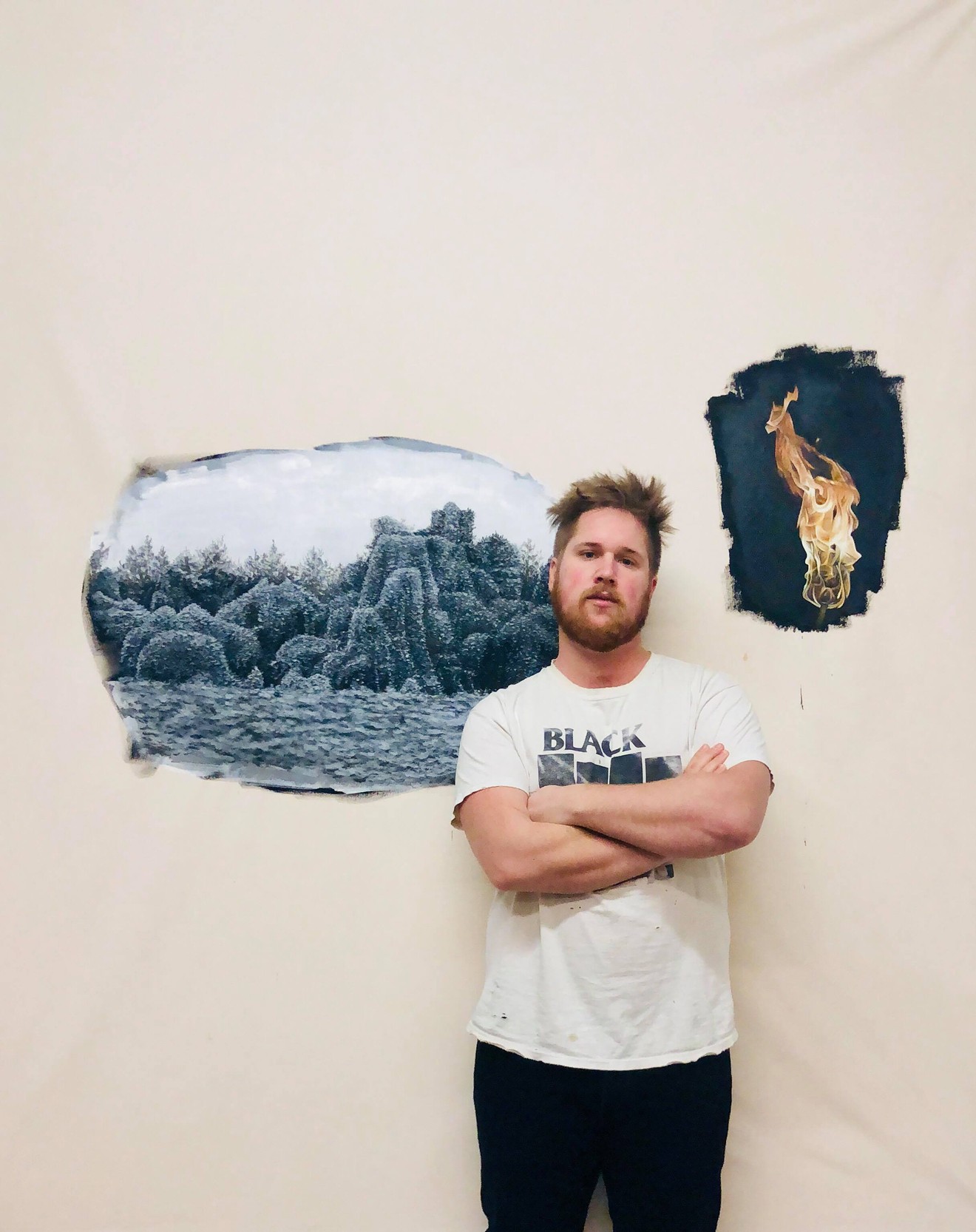 William Binnie stands with "The Vine that Ate the South," still in progress. The painting will be part of an exhibit at the Massachusetts Museum of Contemporary Art that opens in March.