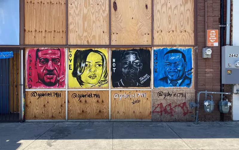 Image: One mural by Gabriel Thomas depicts the late George Floyd, Atatiana Jefferson, Jordan Edwards and Botham Jean.