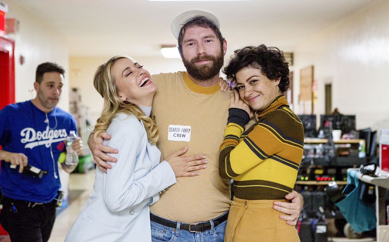 Cast members Meredith Hagner (left) and Alia Shawkat (right) with series creator Charles Rogers (center) .
