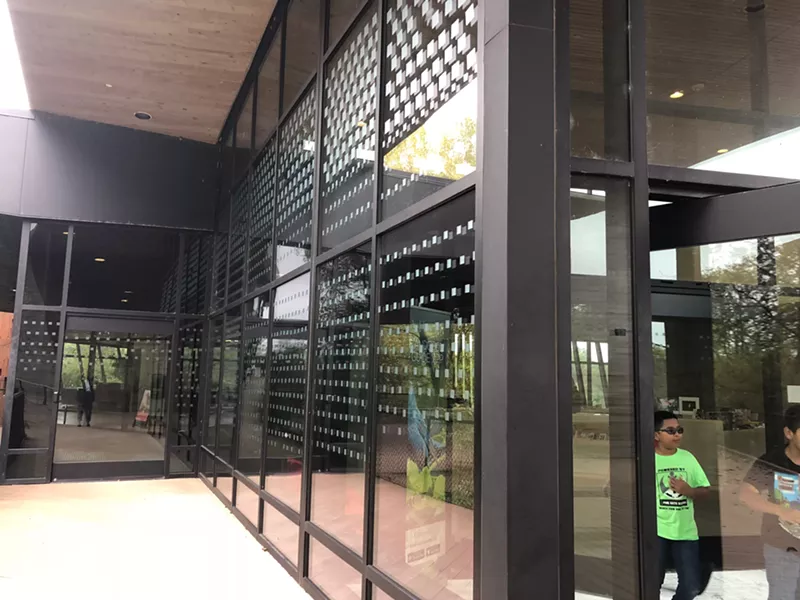 Image: The Trinity River Audubon Center in Dallas has decorative decals on their windows so birds don't collide with them and die.