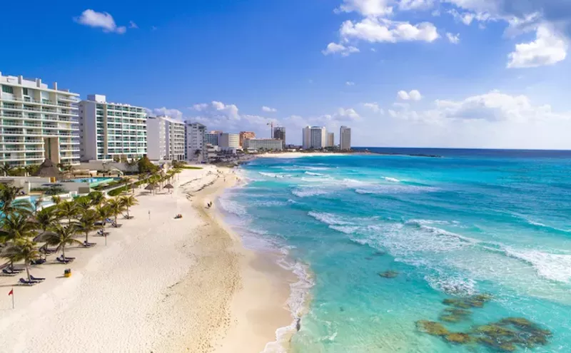 Image: Dallas Couple Close to Winning Cancun.com CEO Position That Pays $10K a Month to Play