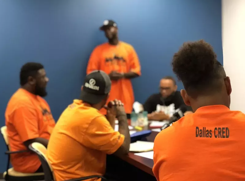 Image: Initially, Dallas Cred was a team of 12. Now, as it scales back its efforts, there are eight members.