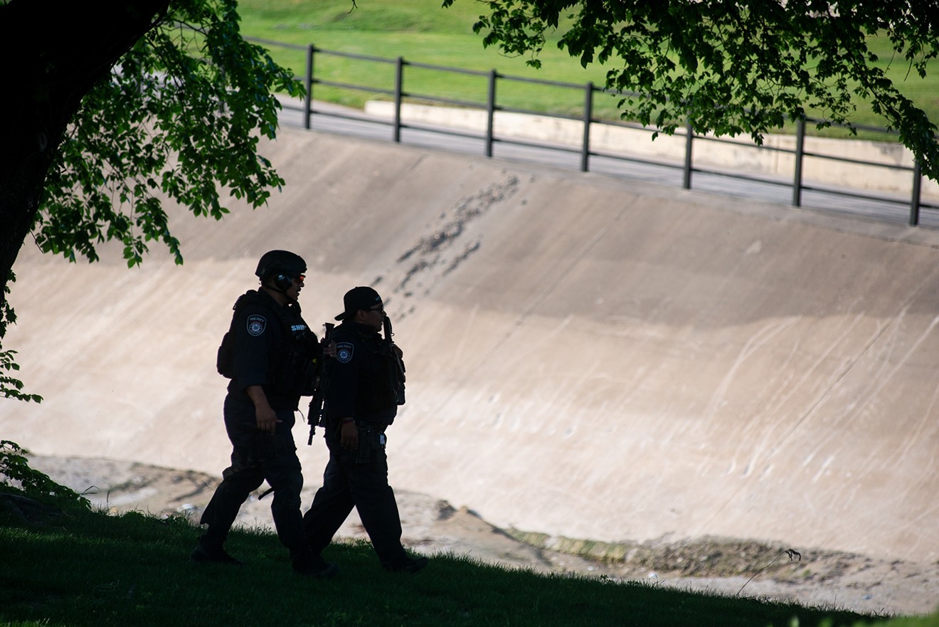 Police searched along White Rock Creek near Central Expressway last month for the person who shot and critically wounded two Dallas police officers and a civilian at a nearby Home Depot.