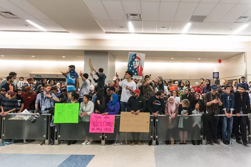 Image: Protesters gathered at D/FW Airport's Terminal D after President Donald Trump issued a travel ban.