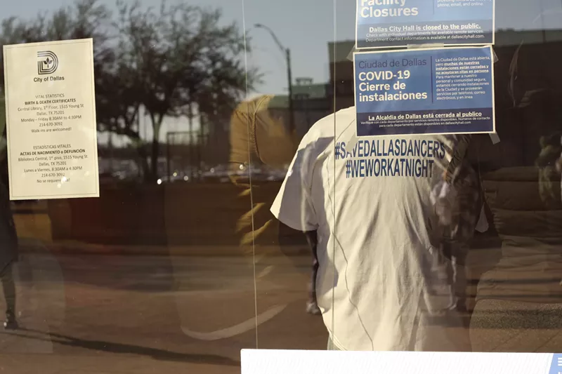 Image: A protester waits to get into City Hall to speak against an ordinance that would see sexually oriented businesses close between 2 a.m. and 6 a.m.