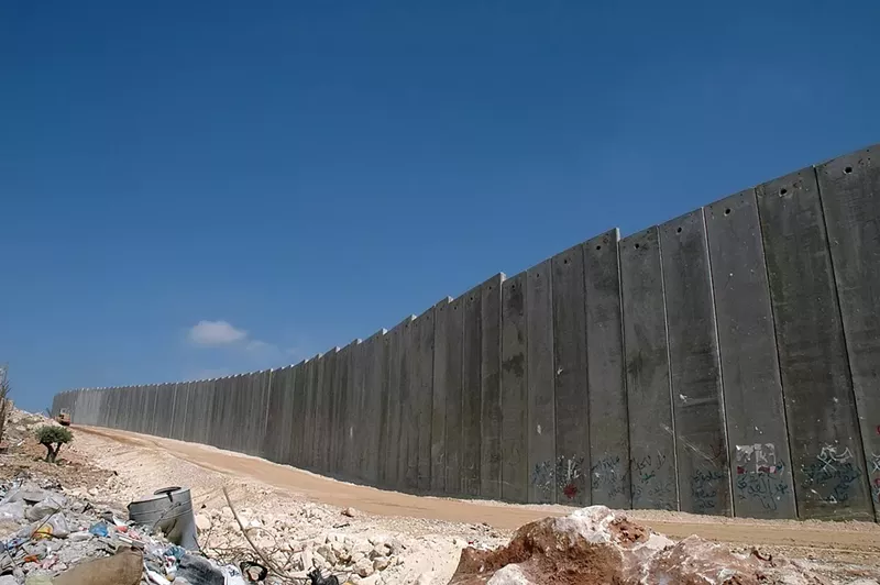 Image: If the BDS movement were to succeed in achieving all its goals, the barrier wall between Israel and the West Bank would come down.