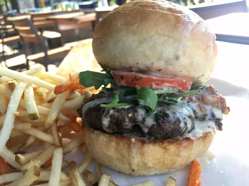 Image: The Loaded Bun Burger, which has a top bun that's bursting with liquid Gouda; $14.