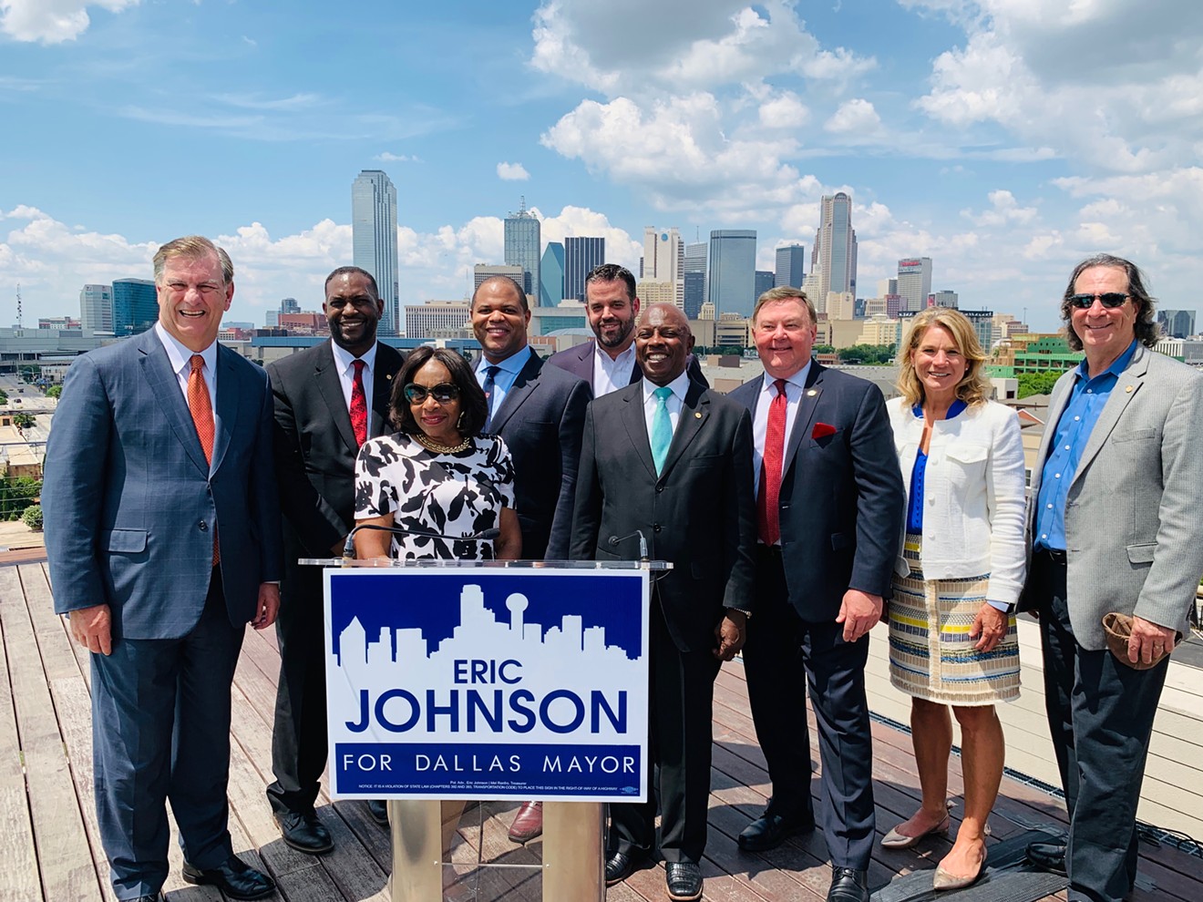 From left: Dallas Mayor Mike Rawlings, Dallas City Council member Casey Thomas, City Council member Carolyn King Arnold, state Representative and mayoral candidate Eric Johnson, City Council member Adam McGough, City Council member Tennell Atkins, City Council member Rickey Callahan, City Council member Jennifer Gates and City Council member Lee Kleinman