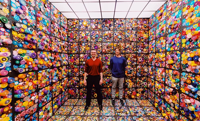 Image: Scrolling along: the Ladd brothers and their scroll-filled room.