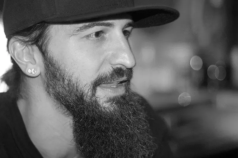 Image: Bradlee does double duty as a DJ and a bartender at dance spots Beauty Bar and It'll Do.