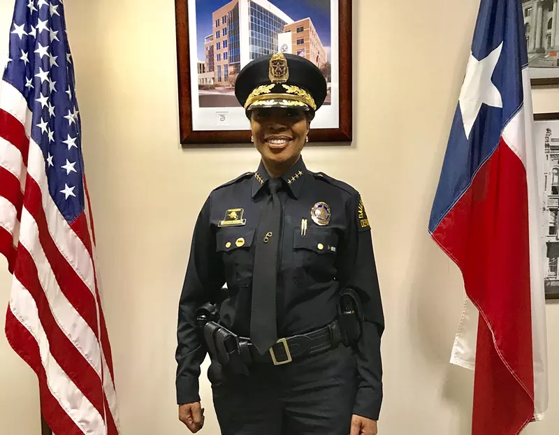 Image: Dallas Police Chief U. Renee Hall shows off her uniform after passing the Texas Commission on Law Enforcement licensing exam.