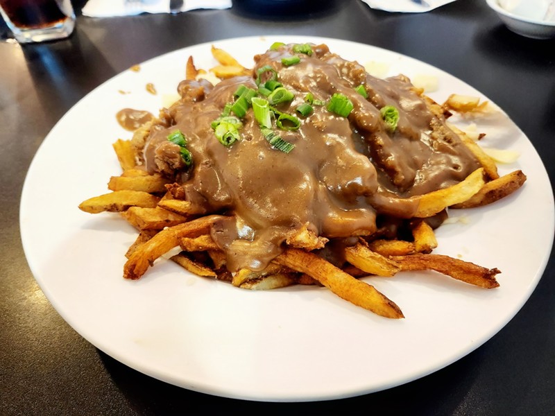 The famous poutine over chicken fried steak (yes, there's a chicken fried steak somewhere in there).