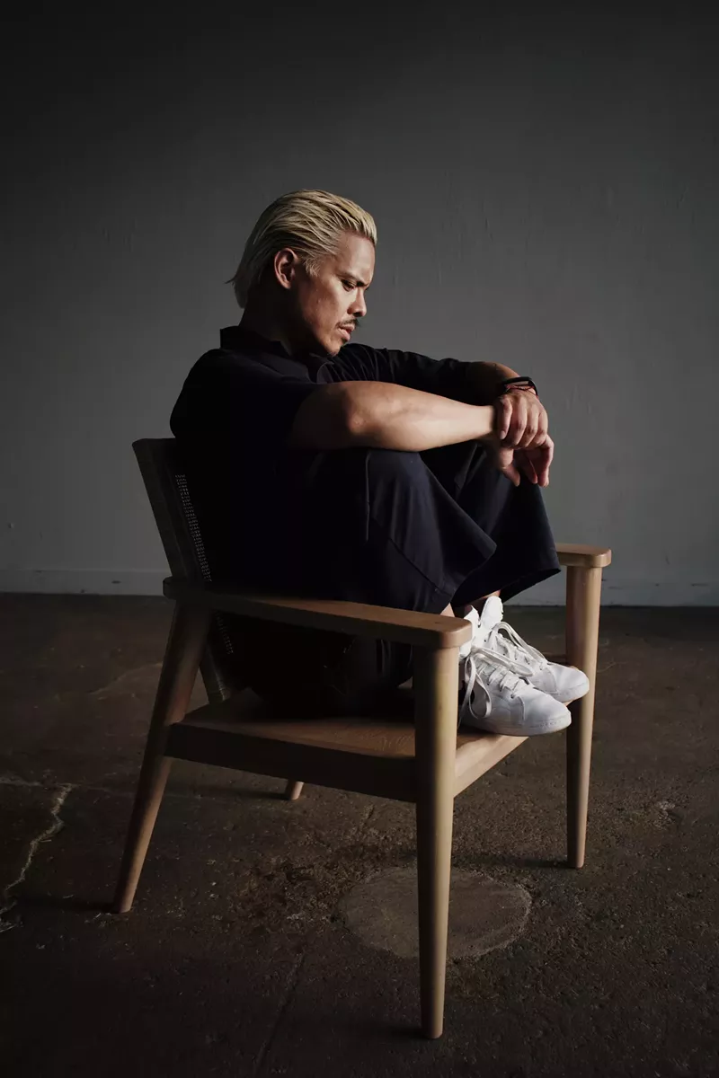 Image: man sitting in chair