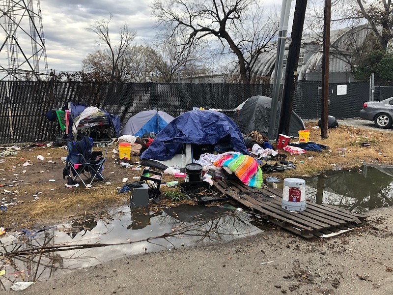 The city has tried to eliminate homeless encampments, like this one in South Dallas, through aggressive code enforcement.