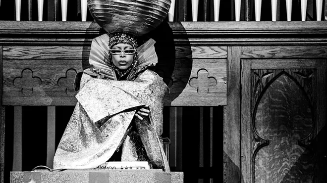 Photo of a woman performing on stage