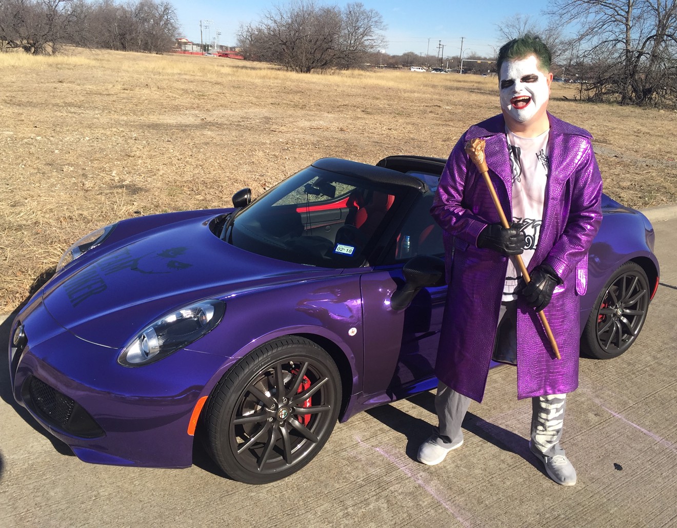 Daniel Burch of Arlington spends his free time driving around Dallas in his purple-wrapped 2015 Alfa Romeo 4C Spider dressed as the iconic comic book villain the Joker.