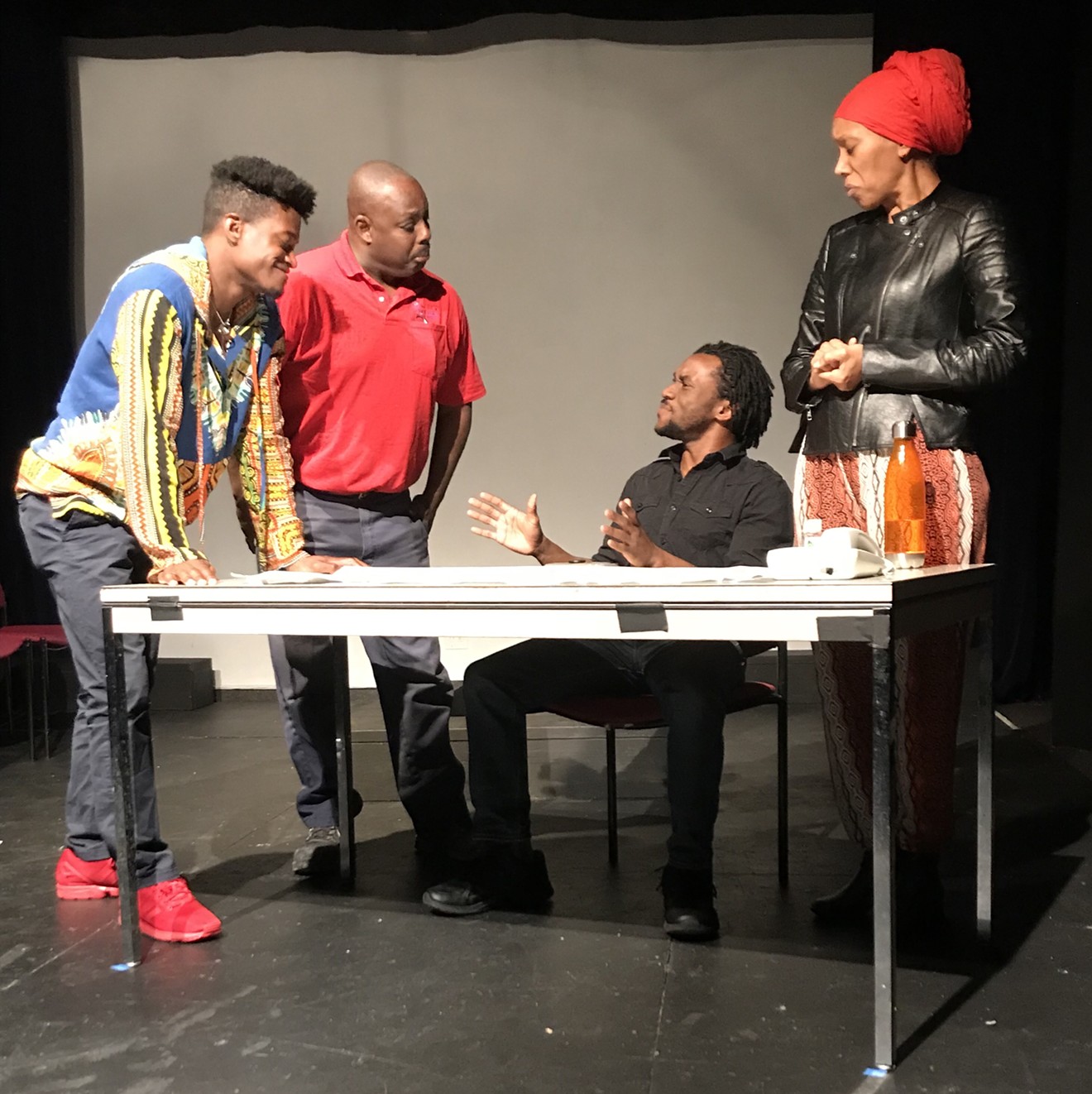 The cast of Day of Absence rehearses for their play about a town's black residents disappearing.