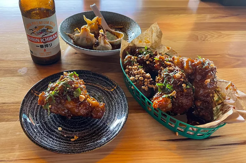 Image: Korean twice-fried wings and steamed dumplings at Hawkers in Deep Ellum