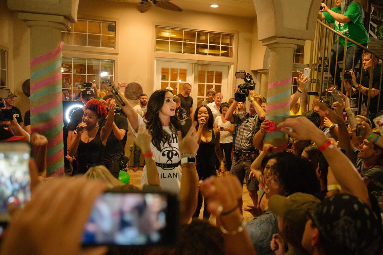 Demi Lovato performs at a fan's house in Southlake.