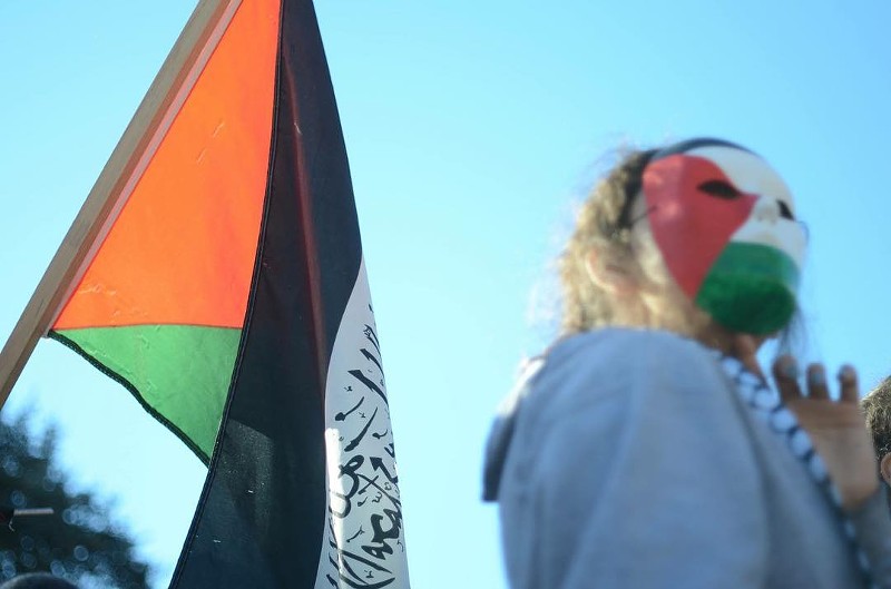 A pro-Palestinian protester at a 2017 demonstration in Dallas. A rally is scheduled for 2 p.m. on Sunday at City Hall, 1500 Marilla St.