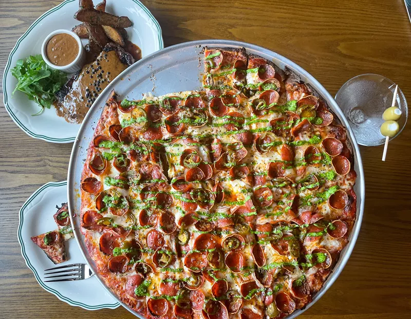 Image: The pizza here is cracker thin.