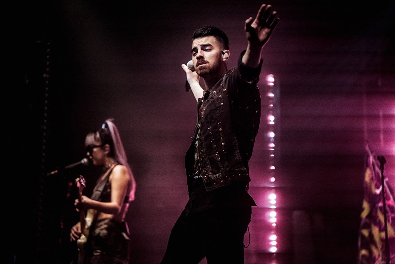 Joe Jonas is flying away as fast as he can from the pure image of his Disney family band.