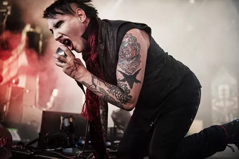 Image: Marilyn Manson performing onstage in Dallas.