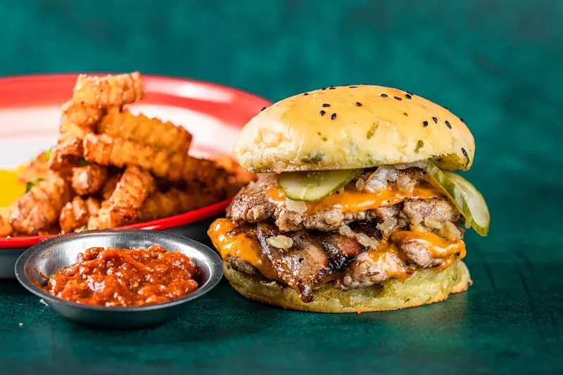 Image: The burger from Khao Len focuses on pork from Chubby Dog Farm.