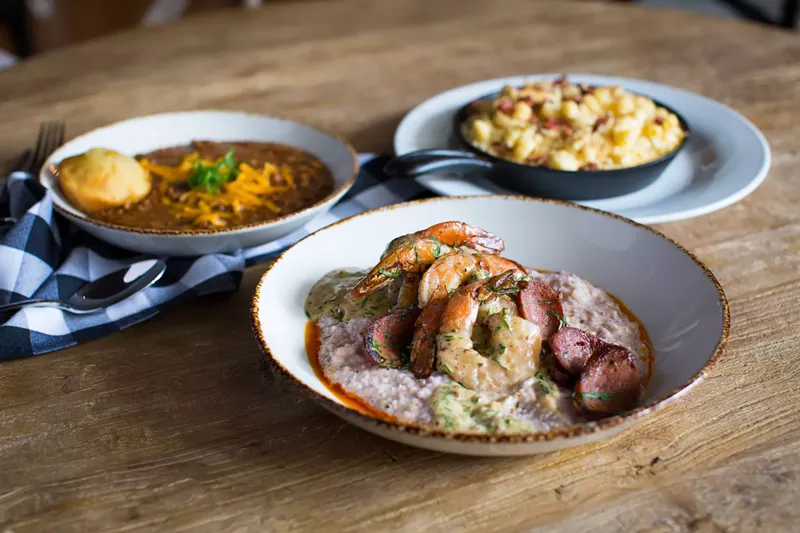 Image: Shrimp and blue corn grits (front) at the new Elm Street Cask and Kitchen