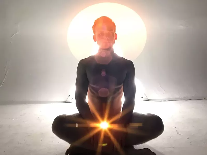 Image: Yoga instructor Nick swears by the benefits of naked yoga.