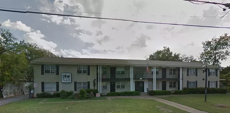 Image: The white lattice fence struck by the stolen vehicle allegedly driven by the suspect can be seen in this Google Maps image of the Five Trees apartment complex.
