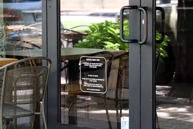 Image: A dress code sign on the door at Baboush.