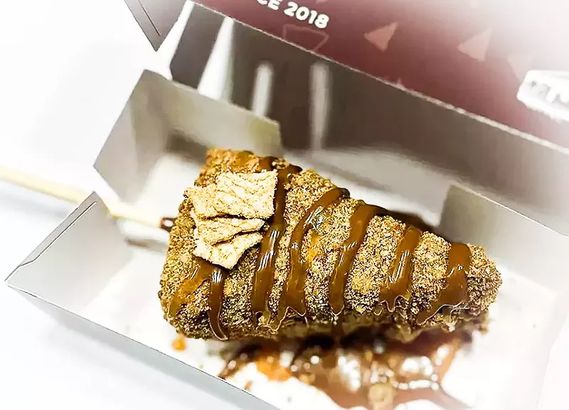 Image: The churro cheesecake, dipped and drizzled.