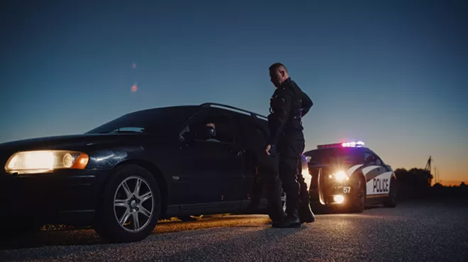 police officer pulling driver over
