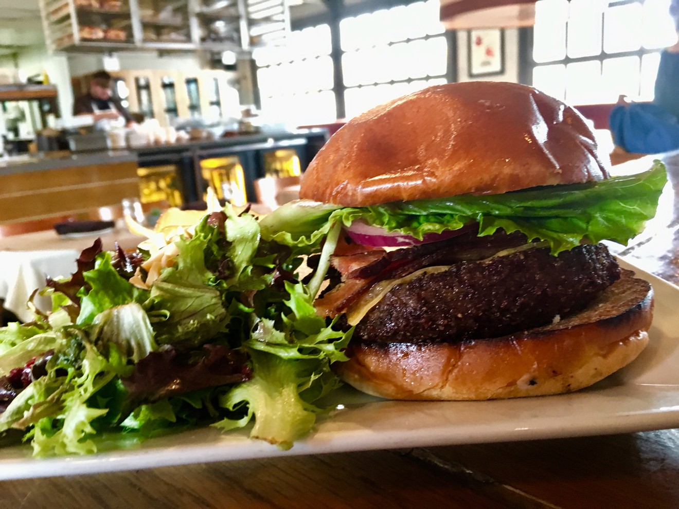 Bolsa's house-ground burger with bacon, cheese, red onion, lettuce and tomato for $15
