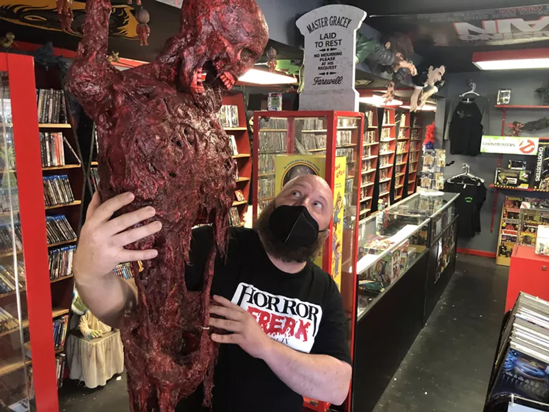 Image: Eric Dallof, the owner of the Horror Freak collectible store in Bedford's Retro Plaza, has the first shop in DFW dedicated to grisly, gory and ghastly horror films and collectibles.