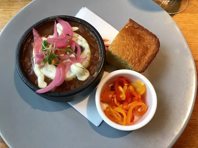 Image: The campfire breakfast ($12) was the closest plate to normal breakfast food, at least it appeared that way on the menu. The mess that the egg and beans became had us wishing we had just ordered another round of prawns.