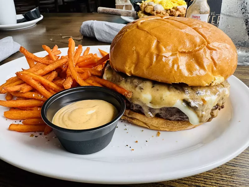 Image: Creamy Mushroom Swiss Burger with sweet potato fries.